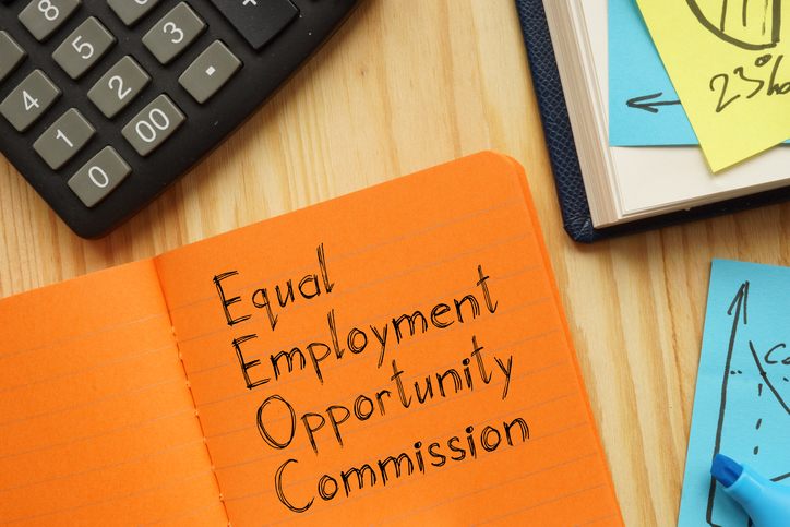 Notebook paper with "Equal Employment Opportunity Commission" written on it.