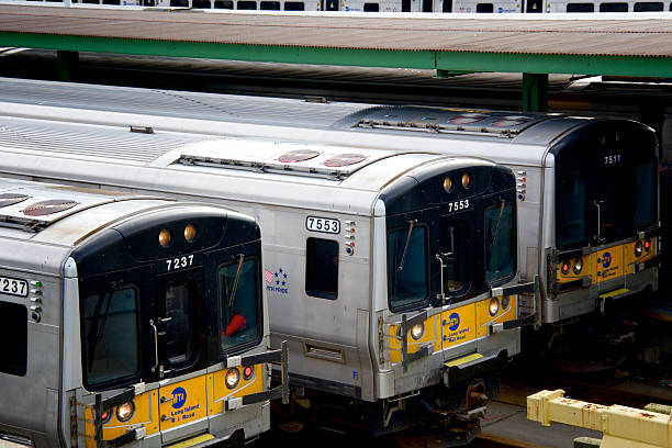 Long Island Railroad passenger trains parked at the West Side Railroad Yard, West Side of Manhattan.