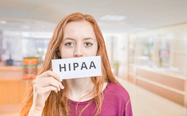 Woman with HIPAA sign over mouth