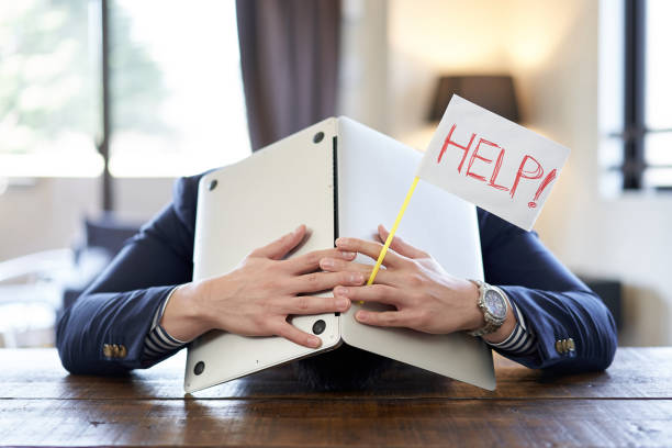 Asian male business person giving up
